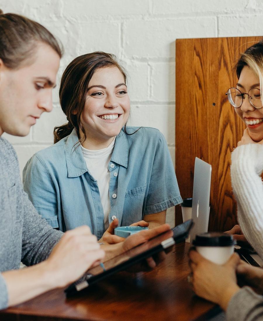 Team discussing ideas around a table